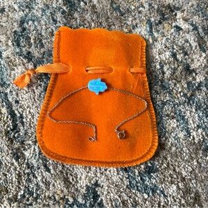 Orange Velvet Jewelry Pouch with Blue Hamsa Hand Bracelet